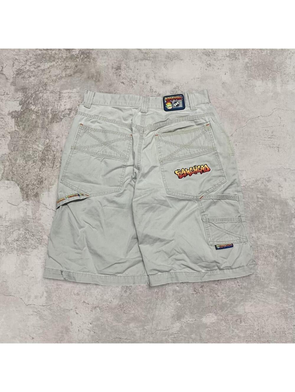 Vintage 90’s JNCO Flamehead tan Cargo shorts with a crazy embroidery